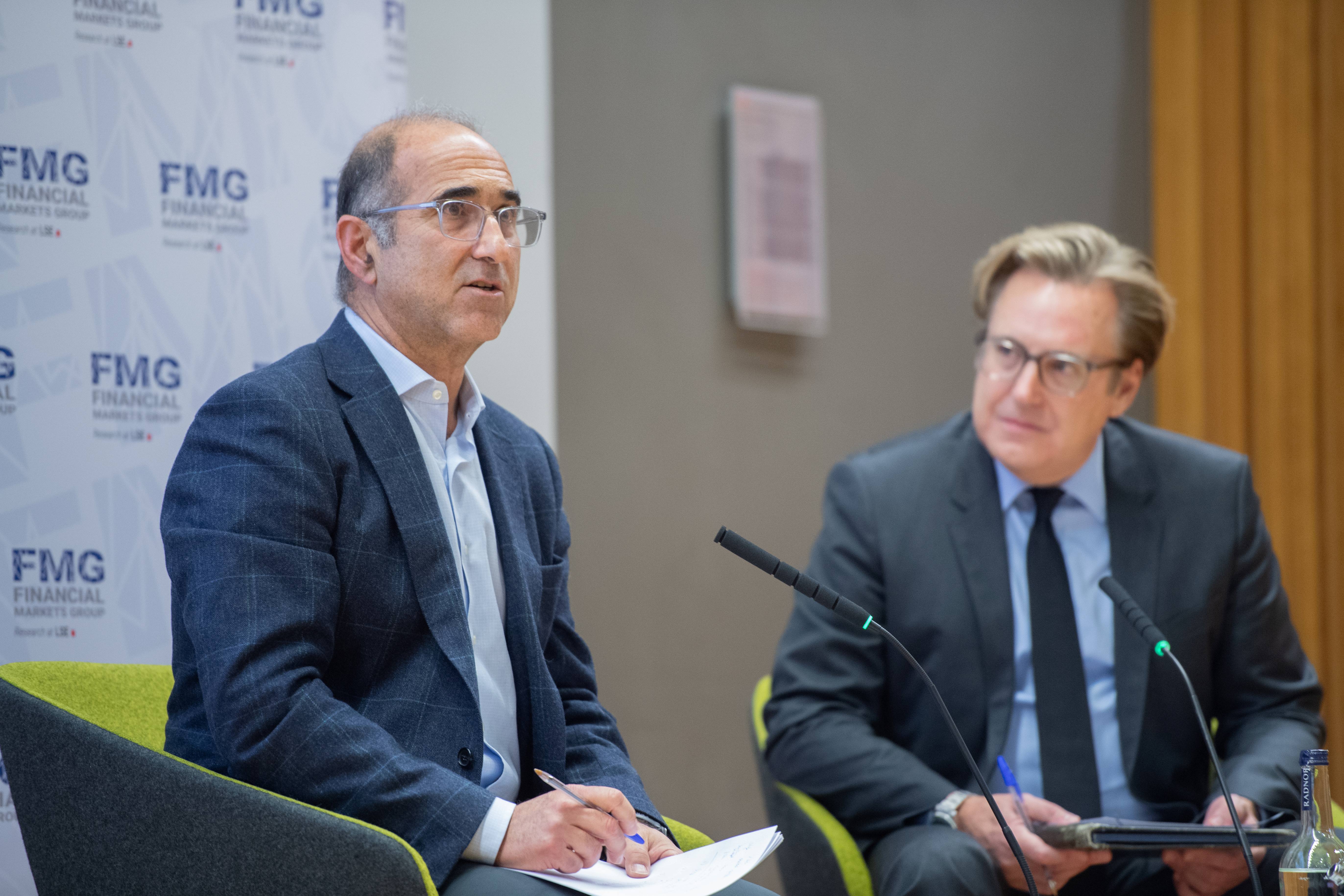 Victor Haghani taking questions as part of the Q&A of his lecture at LSE in Sheikh Zayed Theatre, chaired by Christopher Polk