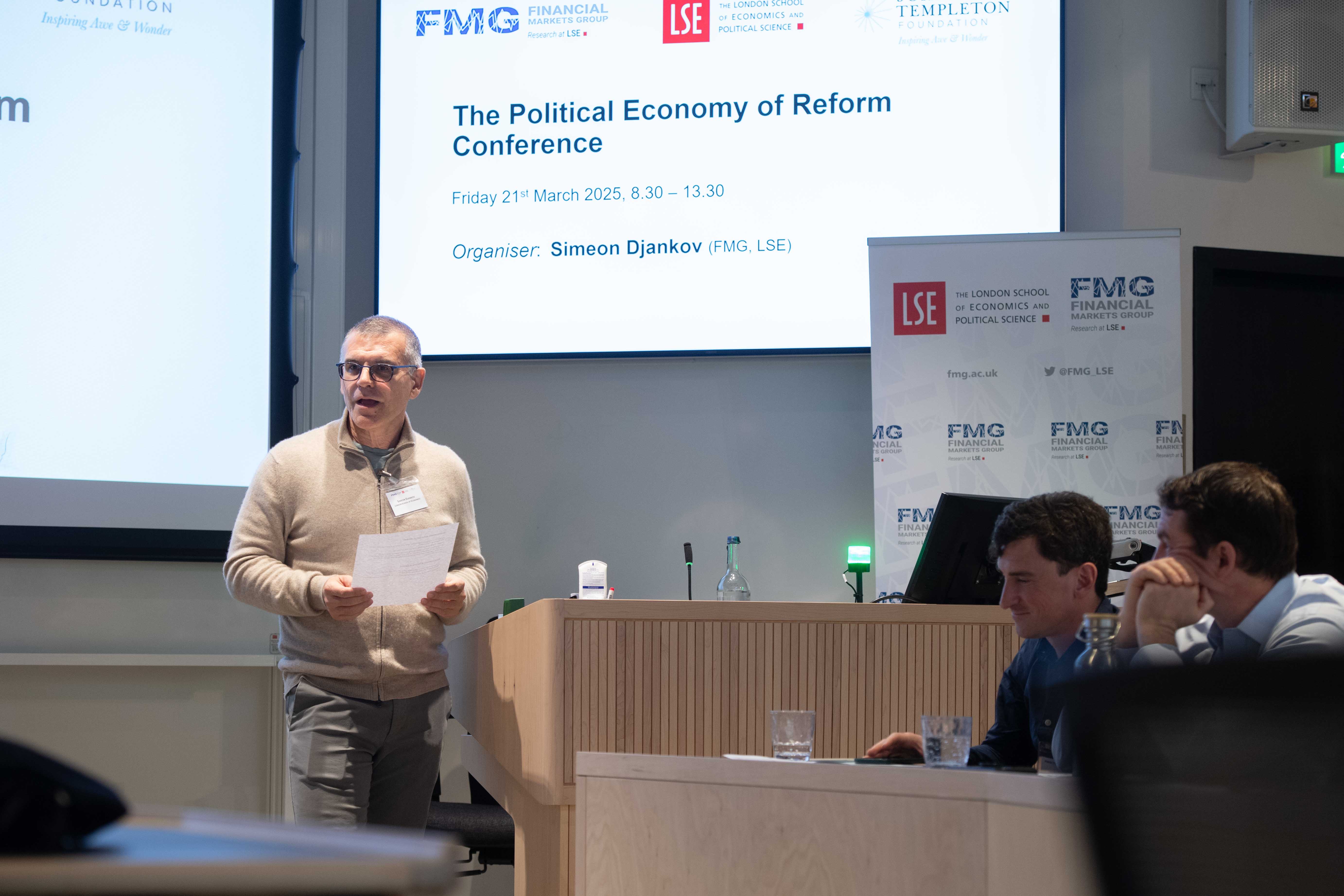 Simeon Djankov speaking from the lectern at The Political Economy of Reform